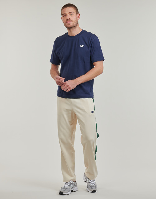 Pantaloni-Sportivi-uomo-New-Balance-SGH-BASKETBALL-TRACK-PANT-Beige-New-Balance-197375355887-1